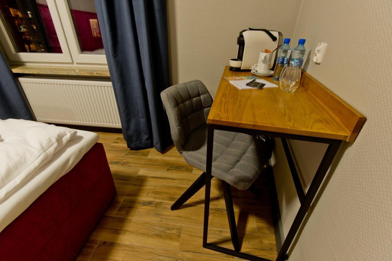 Apartsuites I Sorau Żary Dış mekan fotoğraf A Nespresso machine in a hotel room
